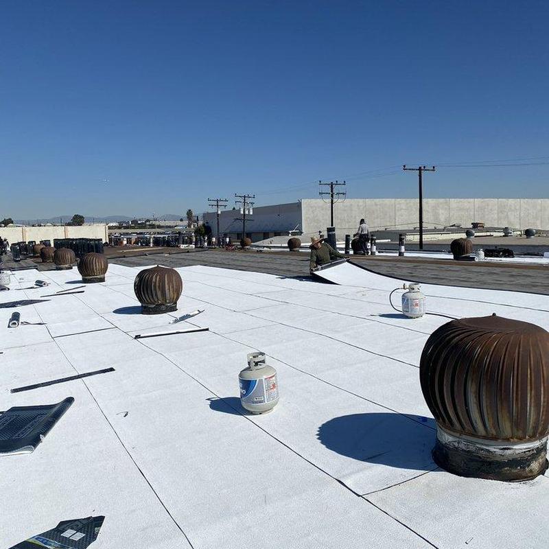 Commercial flat roof inspection with ventilation turbines Commercial flat roof inspection with ventilation turbines