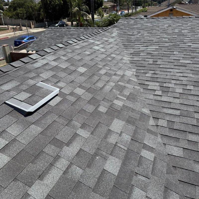 Asphalt shingle roof with ridge vent installation Asphalt shingle roof with ridge vent installation