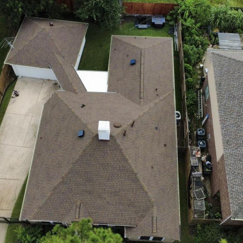 Residential asphalt shingle roof replacement aerial view