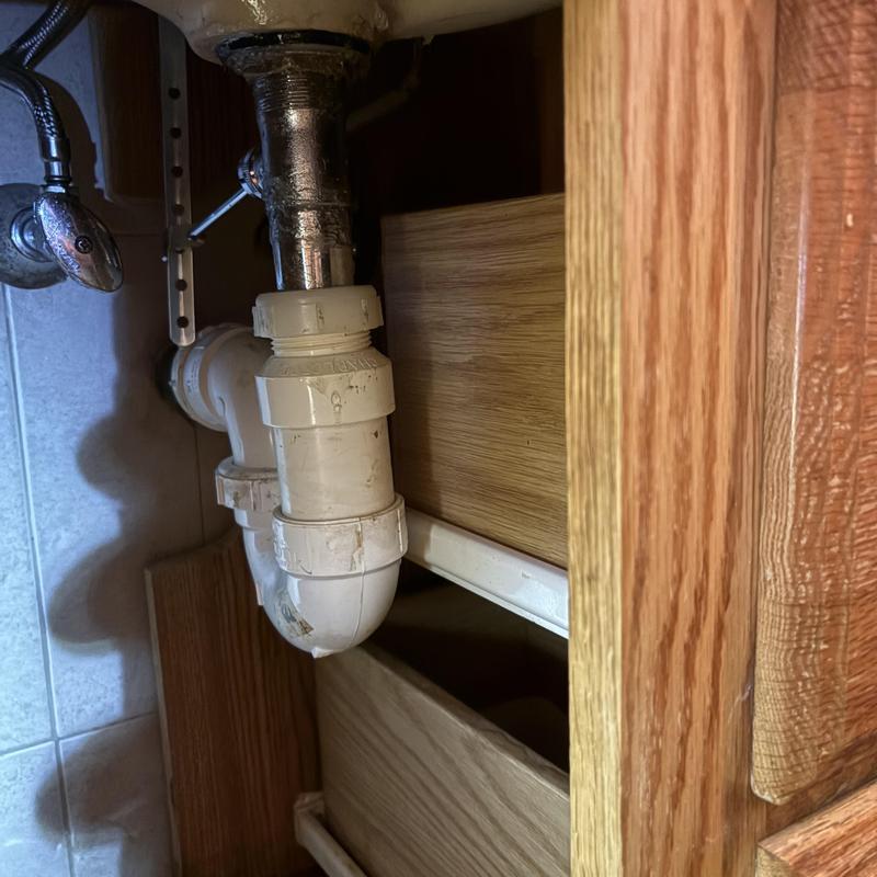 Kitchen sink drain piping with brass pop-up assembly