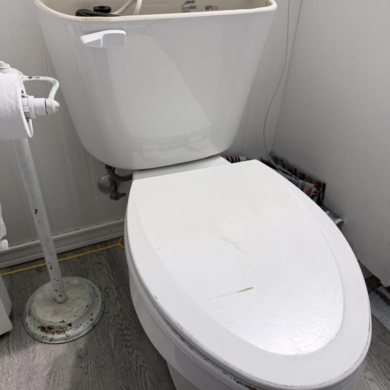 Toilet installation with tank and seat testing
