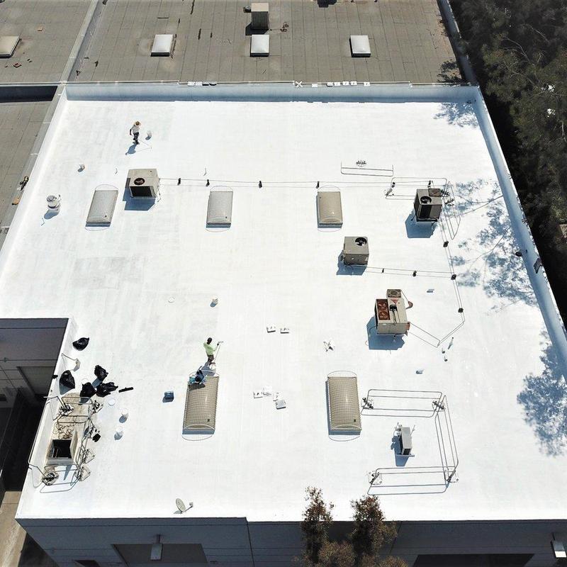 Commercial flat roof coating application in Downey, CA Commercial flat roof coating application in Downey, CA