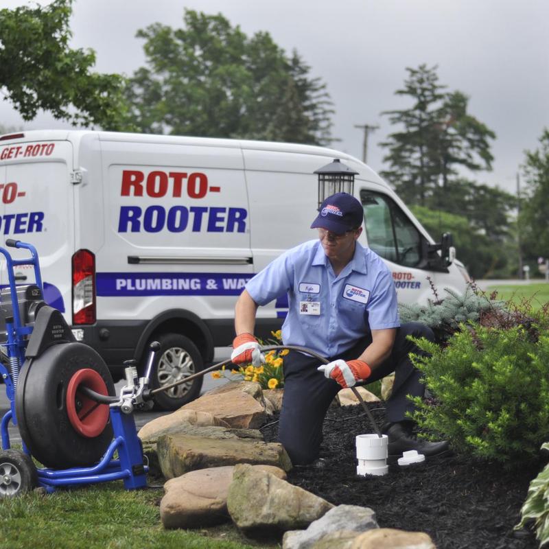 Main sewer line installation through clean out valve