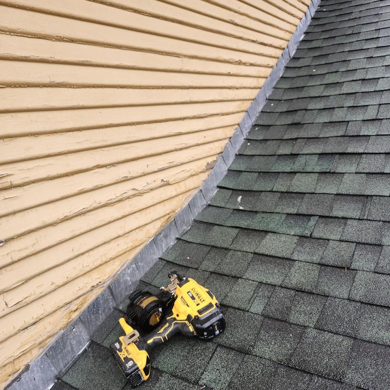 Step flashing installation on roof dormer edge