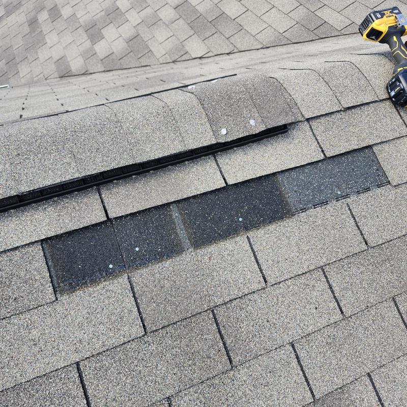 Asphalt shingles with partial replacement and repair on roof