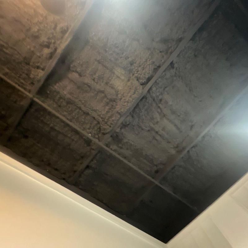 Spray foam roof insulation underlayment in ceiling cavity Spray foam roof insulation underlayment in ceiling cavity