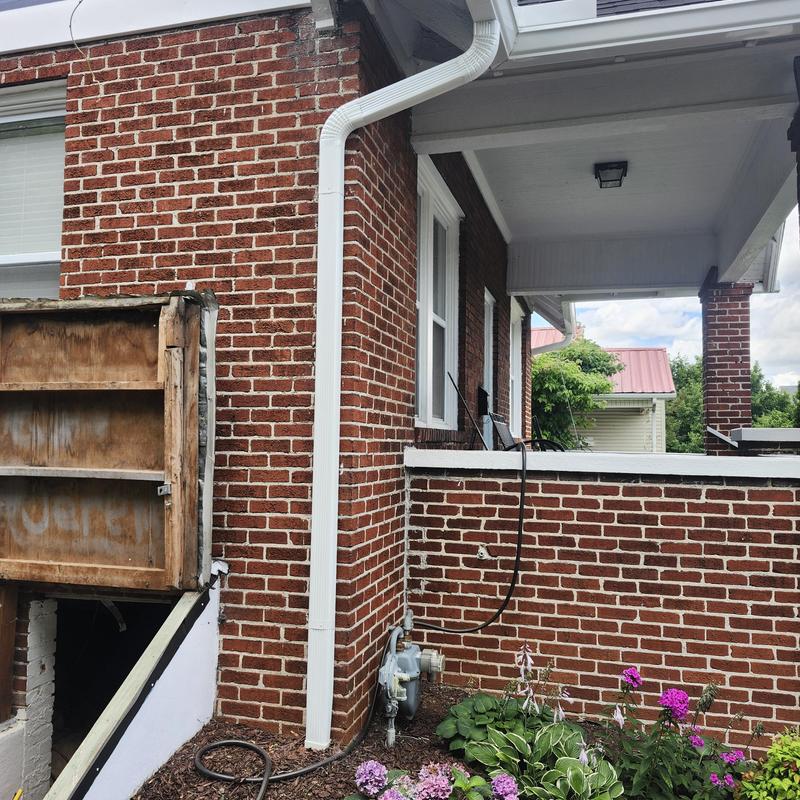 Gutter and downspout replacement with upgraded hangers