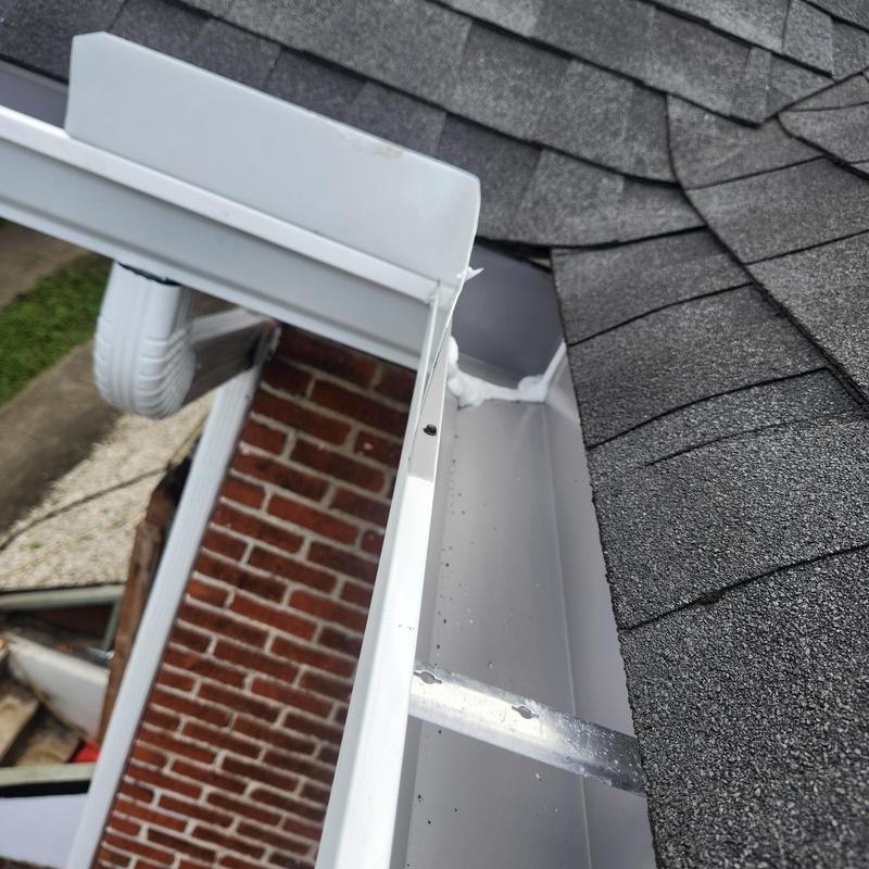 Gutter with upgraded hangers and downspout replacement