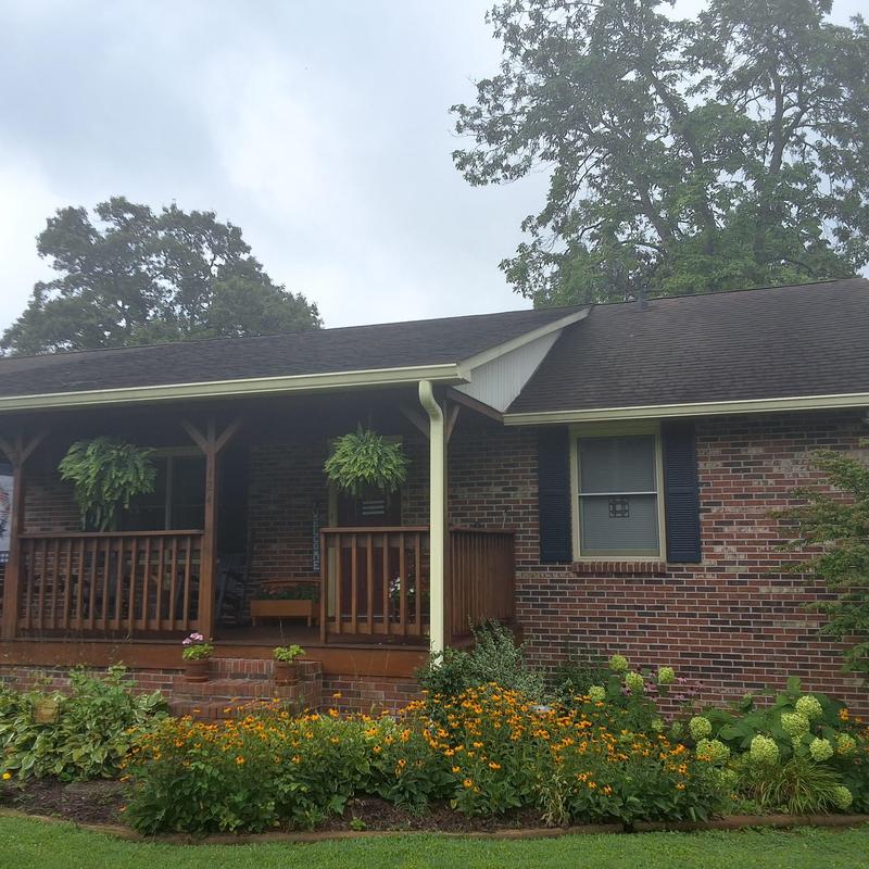 Asphalt shingle roof inspection on brick home