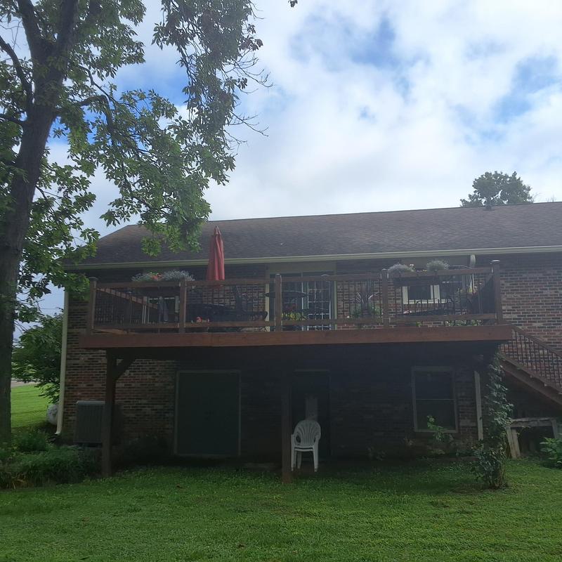Asphalt shingle roof inspection on brick home