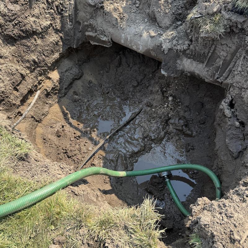 PVB backflow valve installation in irrigation ditch excavation PVB backflow valve installation in irrigation ditch excavation