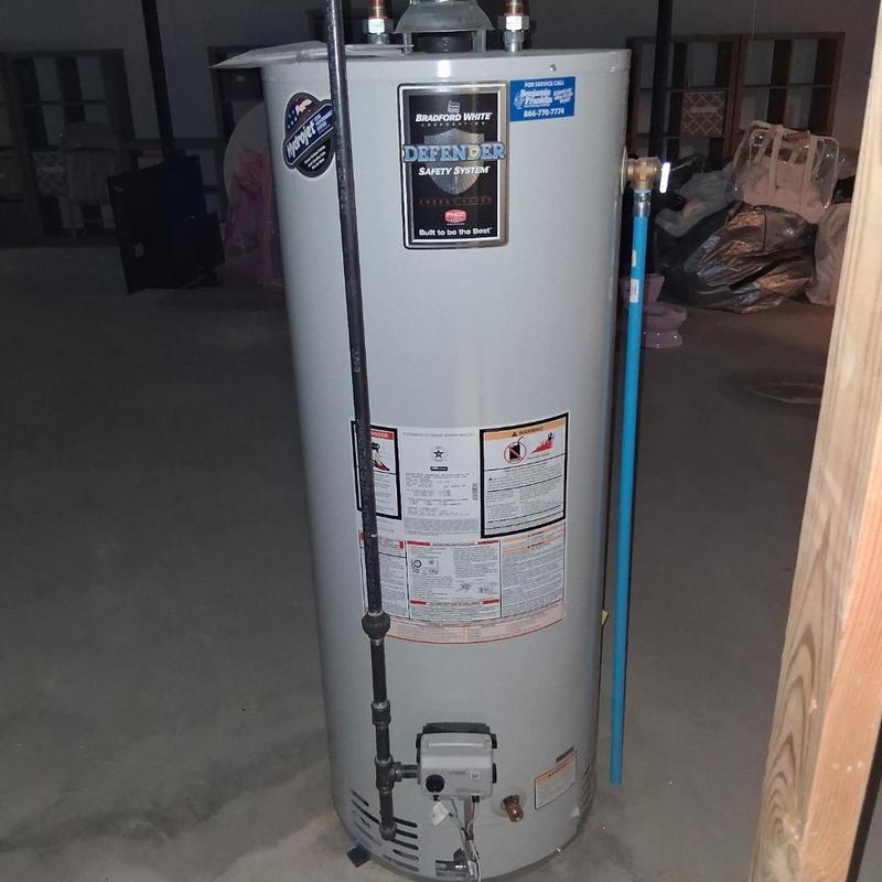 Water heater with gas piping and safety labels Water heater with gas piping and safety labels