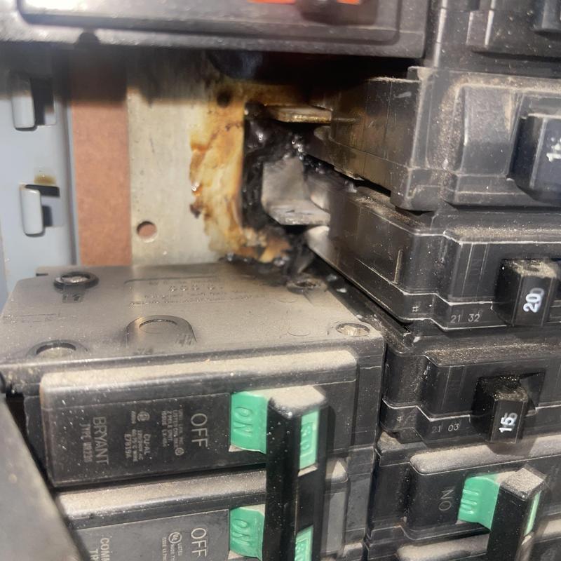 Condenser breaker panel burning damage close-up