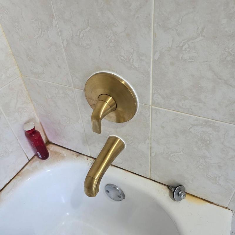 Tub shower valve and spout installation in bathtub Tub shower valve and spout installation in bathtub