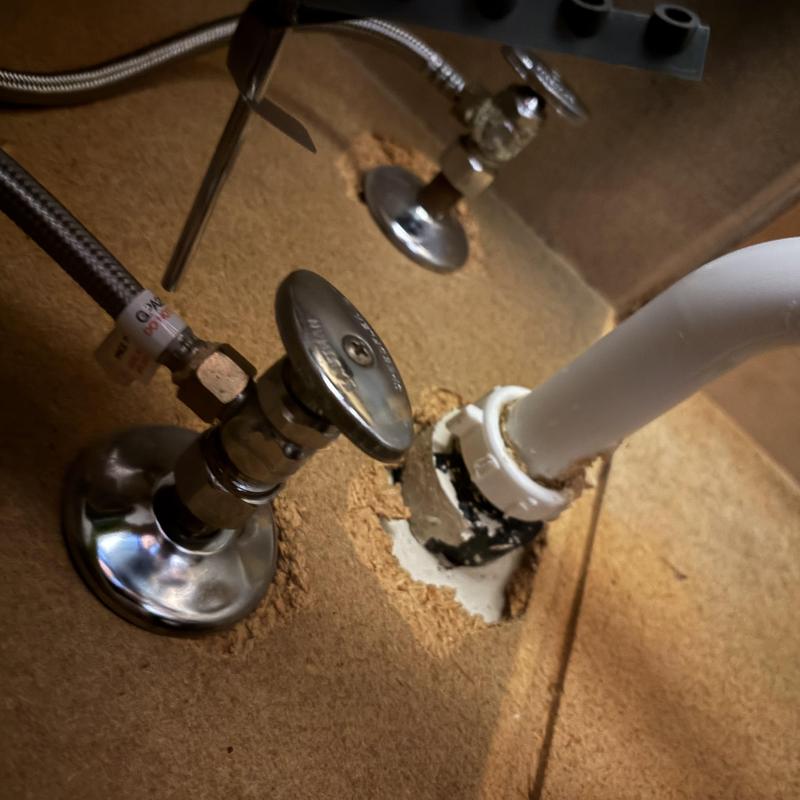 Quarter turn angle stop valve with braided hose under sink