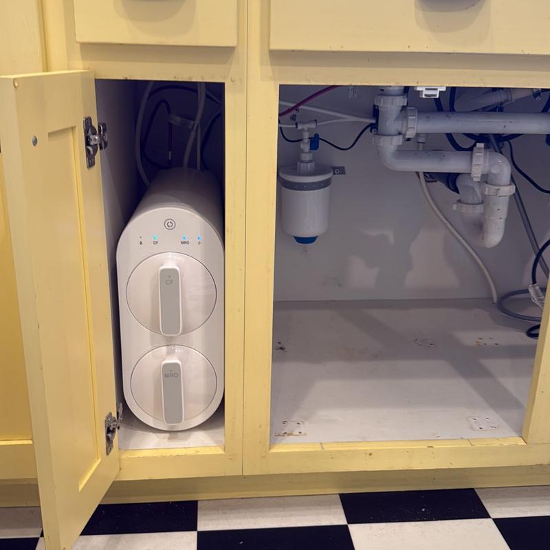 Reverse osmosis water filtration system installed under sink Reverse osmosis water filtration system installed under sink