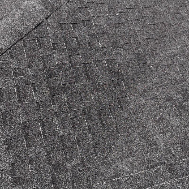 Asphalt shingle roof surface close-up detail
