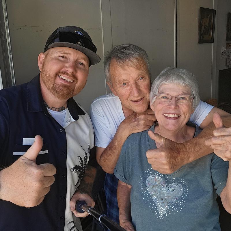Water heater replacement with happy customers thumb up