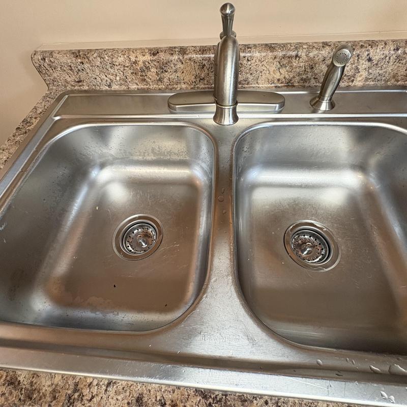 Kitchen sink with dual basket strainers and faucet