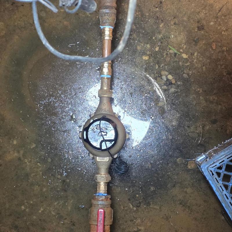 Water meter installation with ball valves in pit Water meter installation with ball valves in pit