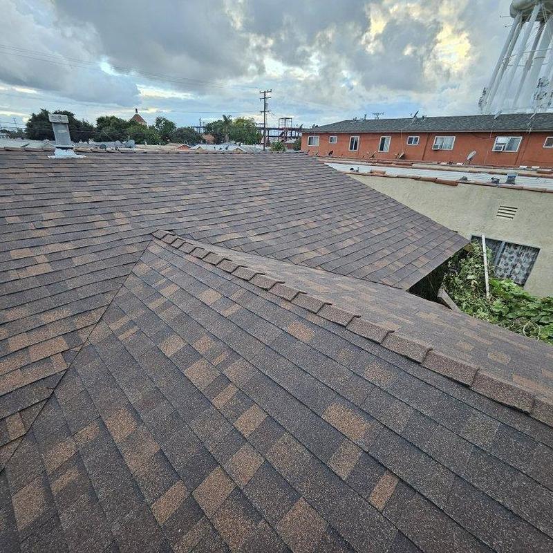 Shingles roof with ridge vent inspection on residential property Shingles roof with ridge vent inspection on residential property