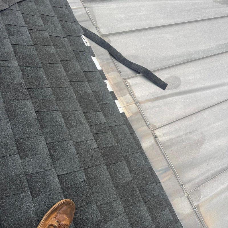 Roof shingles and metal flashing inspection with damage