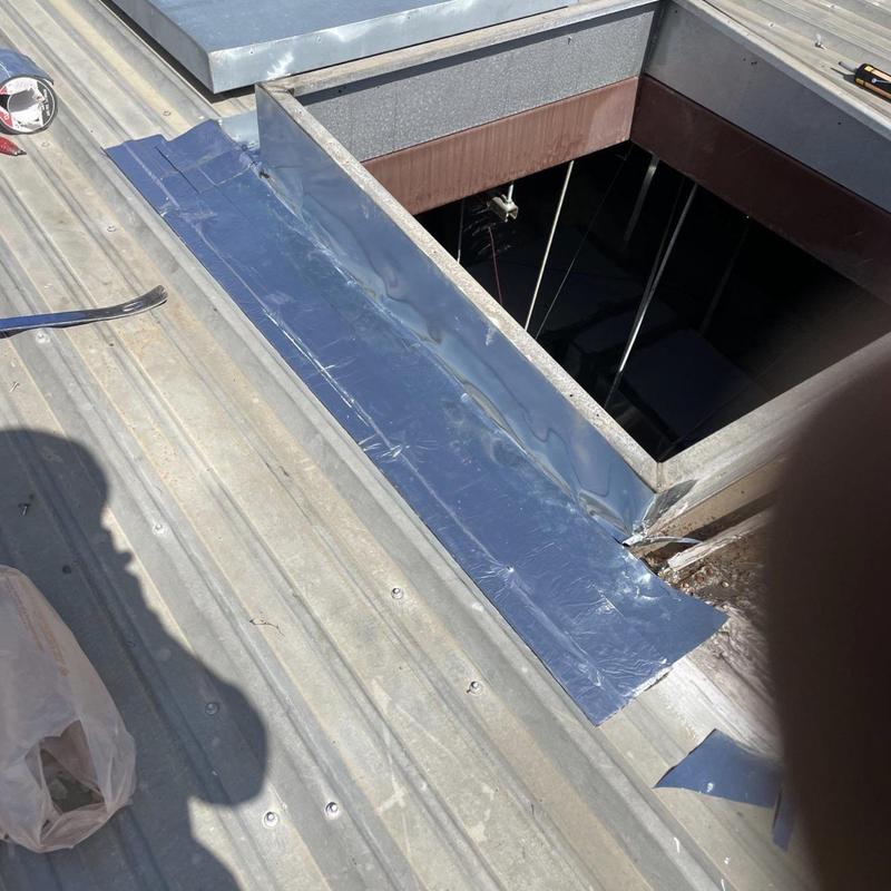 Skylight curb custom flashing on metal roof Skylight curb custom flashing on metal roof