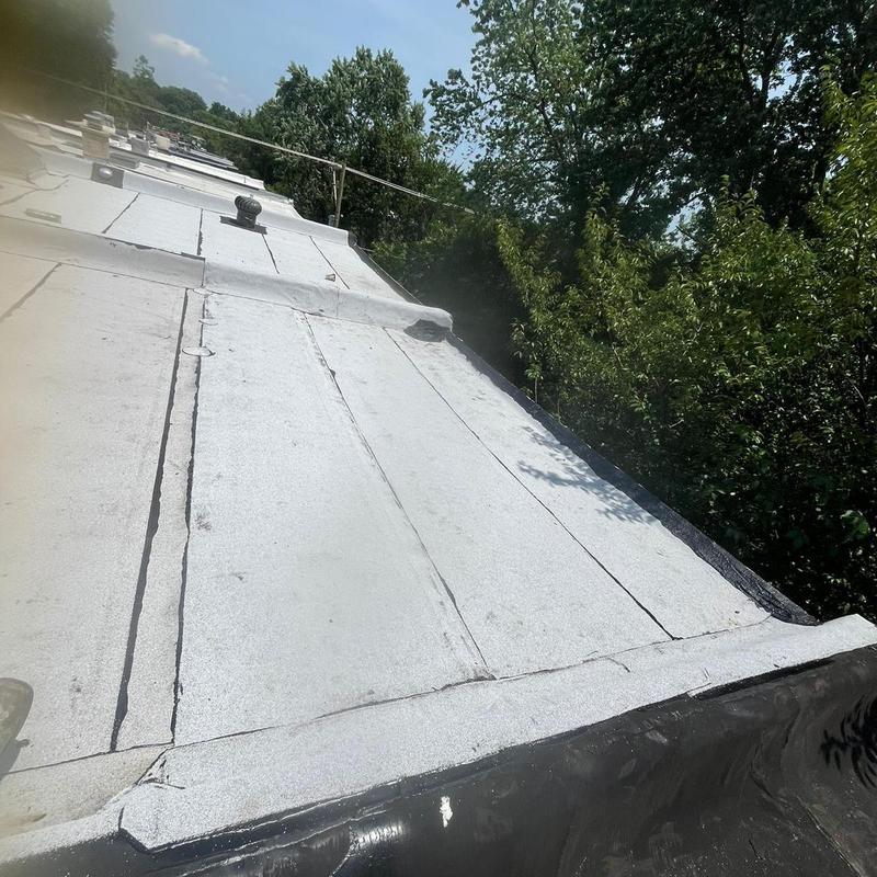 Firestone Modified Bitumen flat roof system installation Firestone Modified Bitumen flat roof system installation