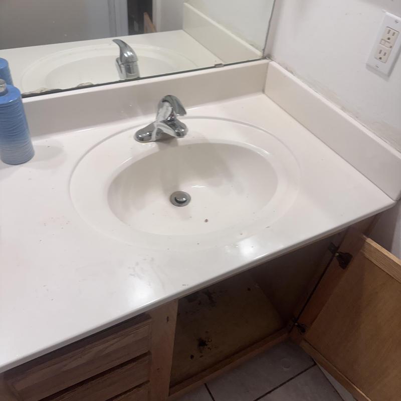 Bathroom sink faucet with pop-up drain and countertop Bathroom sink faucet with pop-up drain and countertop