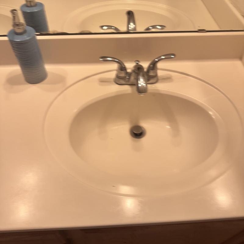 Bathroom sink faucet with pop-up drain and soap dispenser Bathroom sink faucet with pop-up drain and soap dispenser
