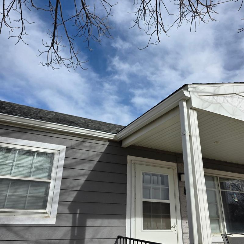 Aluminum gutters on residential home exterior Aluminum gutters on residential home exterior