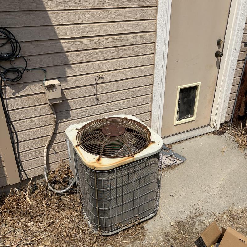 Air conditioner condenser unit with rust and wear
