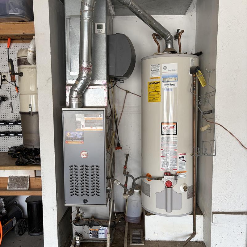 Water heater and furnace with ventilation pipes
