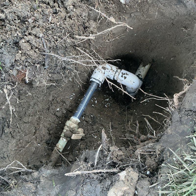 PVC pipe elbow and coupling replacement in soil trench PVC pipe elbow and coupling replacement in soil trench