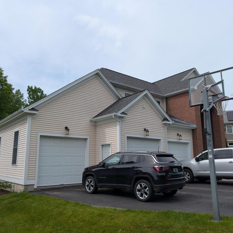 Dimensional shingle roofing on residential garage