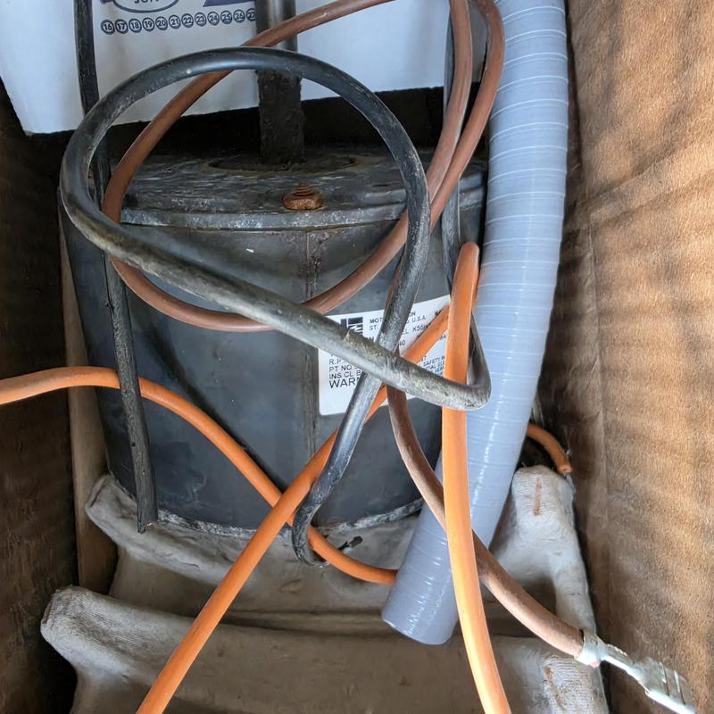 Condenser fan motor with electrical wiring and hoses Condenser fan motor with electrical wiring and hoses