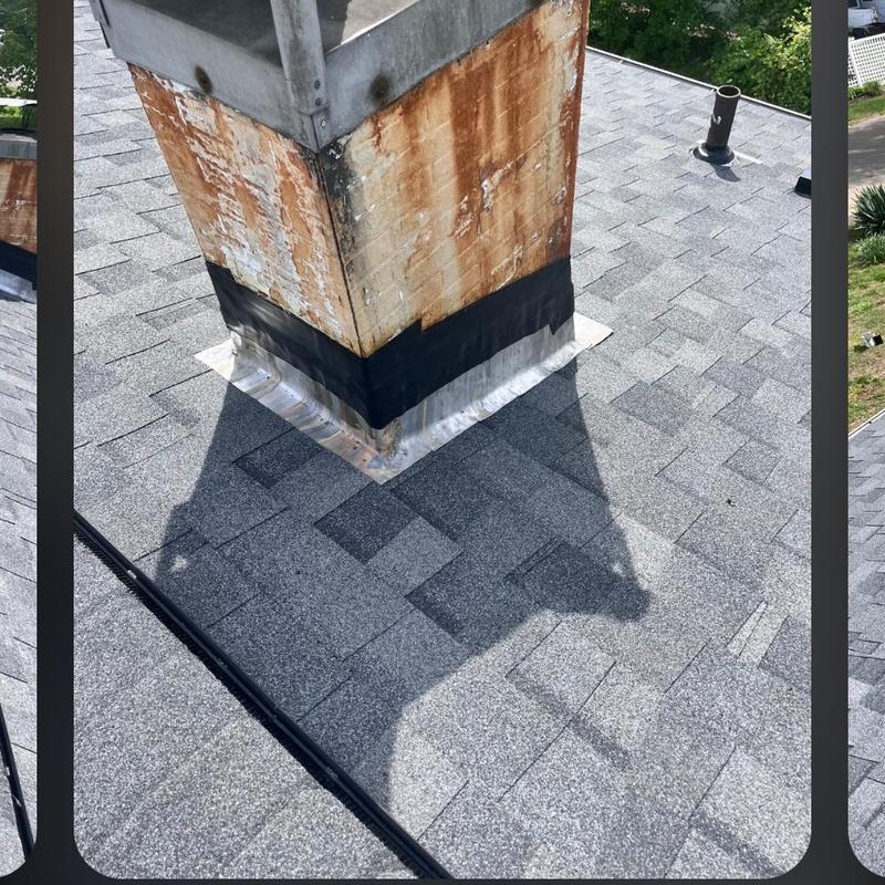 Chimney flashing on shingled roof with metal cap Chimney flashing on shingled roof with metal cap