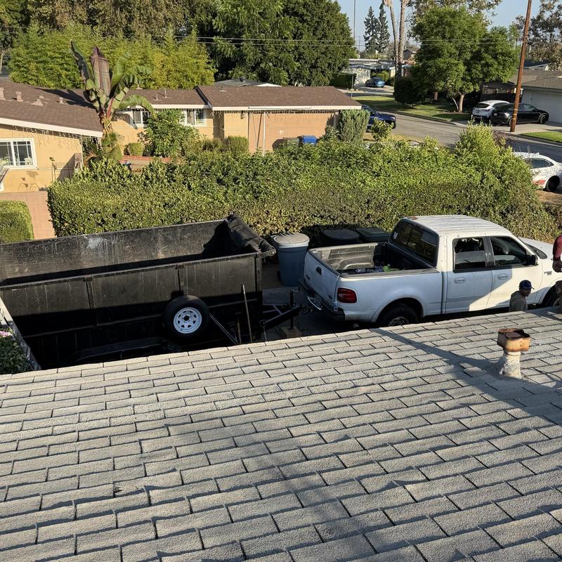 Roof shingles with new replacement materials on site Roof shingles with new replacement materials on site