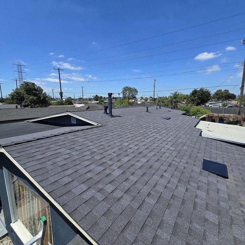 Shingle roof installation on residential house Shingle roof installation on residential house