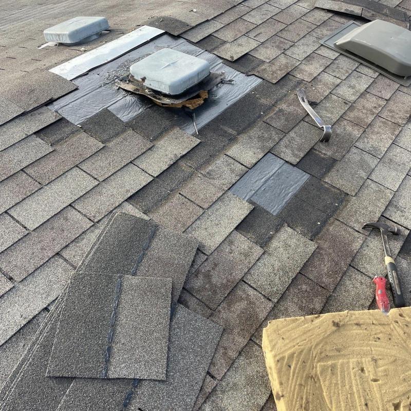 Roof vent flashing and shingle replacement on asphalt roof