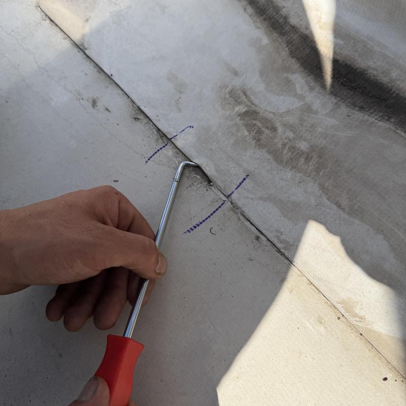 TPO roof membrane seam inspection with tool TPO roof membrane seam inspection with tool