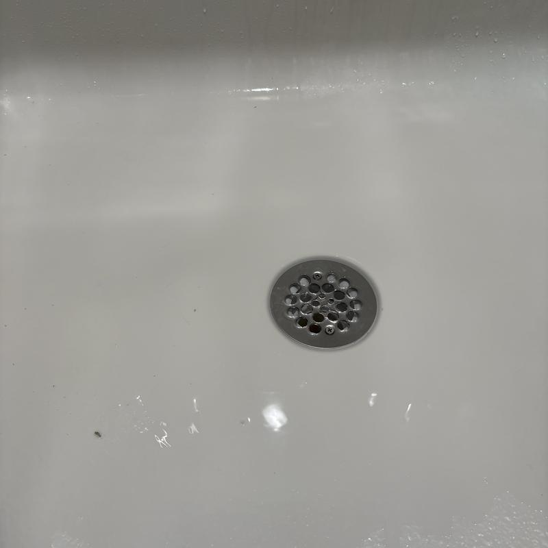 Shower drain strainer replacement in ceiling leak repair