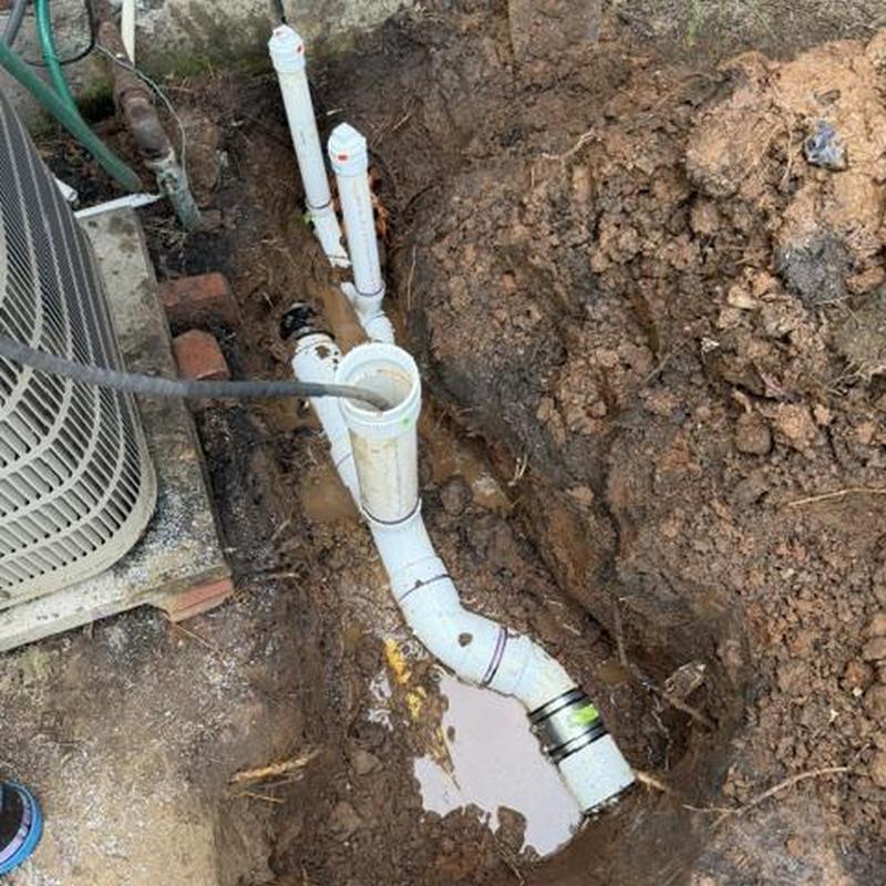 Sewer pipe with root intrusion clearance in muddy ground