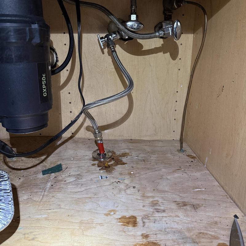 Angle stop valve and supply lines under sink installation