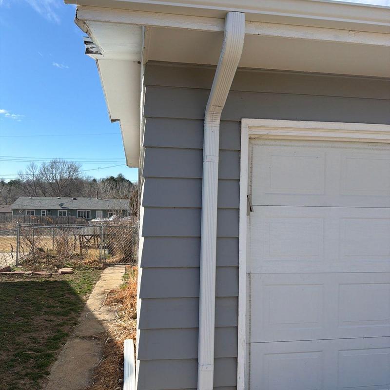 Mastic aluminum gutter downspout on garage side Mastic aluminum gutter downspout on garage side
