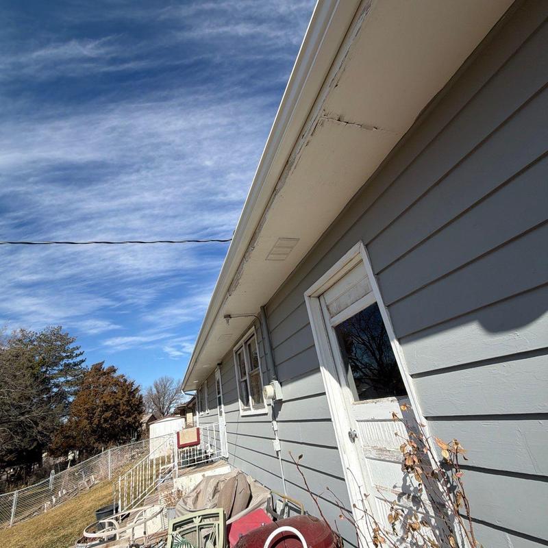 Aluminum gutters on residential home exterior in McCook Aluminum gutters on residential home exterior in McCook