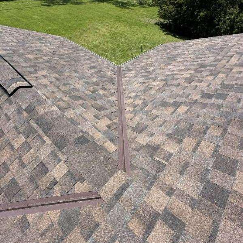 IKO Nordic IR Class 4 shingles on residential roof valley IKO Nordic IR Class 4 shingles on residential roof valley