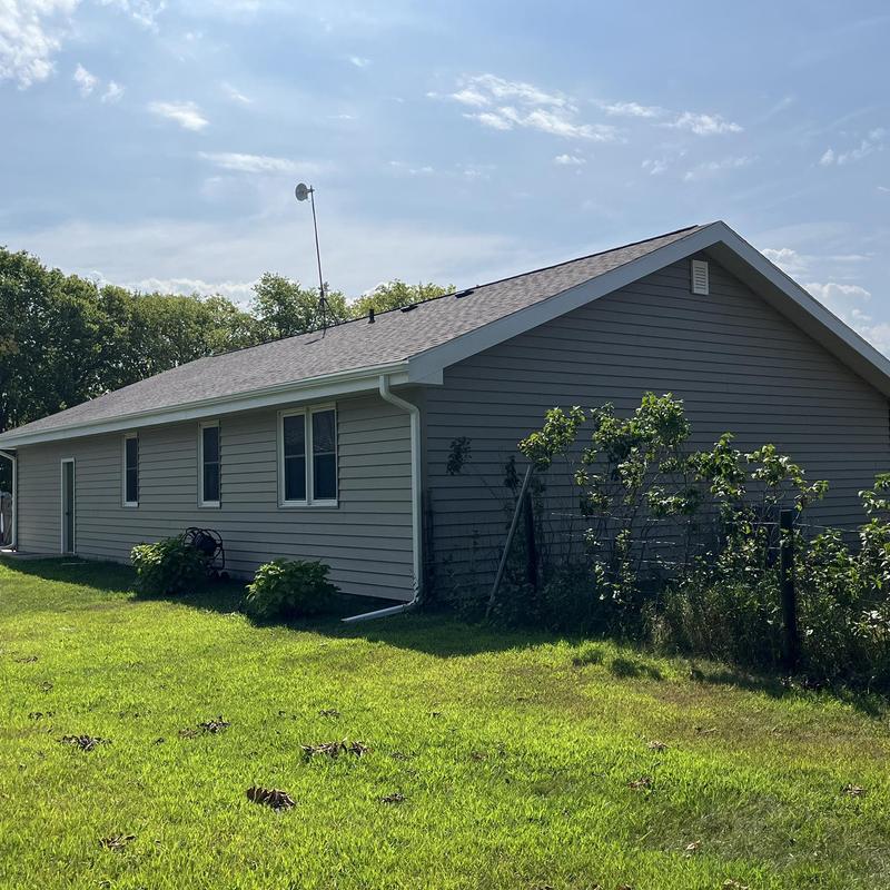 Mastic aluminum gutters on residential home exterior Mastic aluminum gutters on residential home exterior