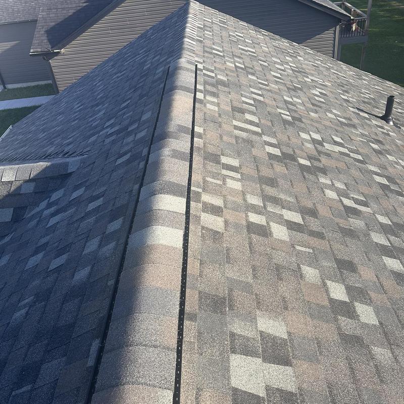 Tamko Stormfighter Flex shingles on residential roof Tamko Stormfighter Flex shingles on residential roof
