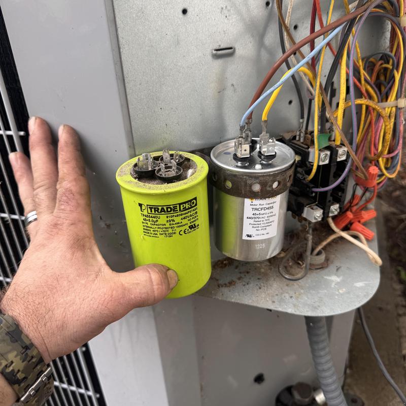 HVAC start assist capacitor replacement near wiring panel